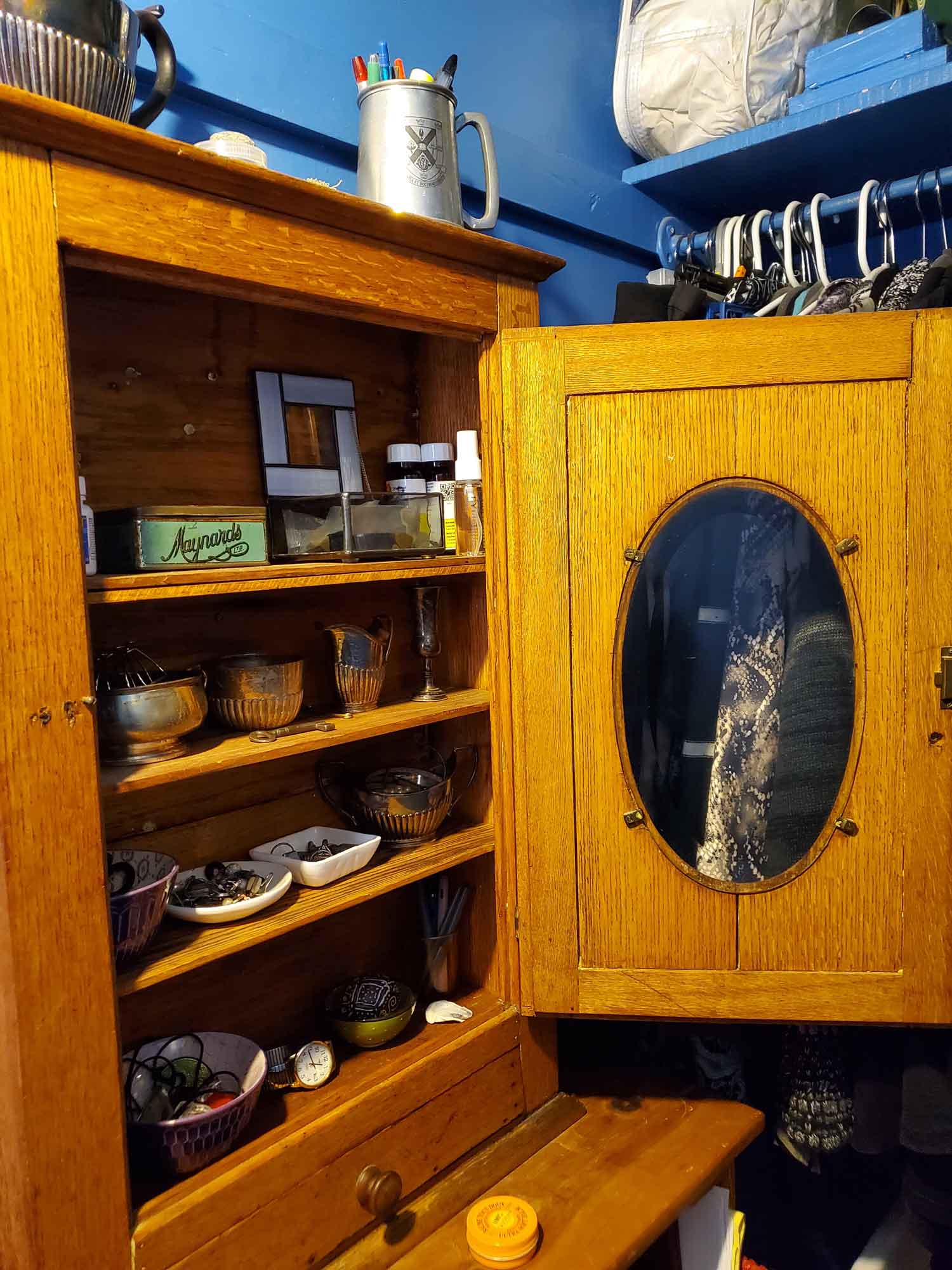 Focus on the inside of the cabinet with items neatly sorted